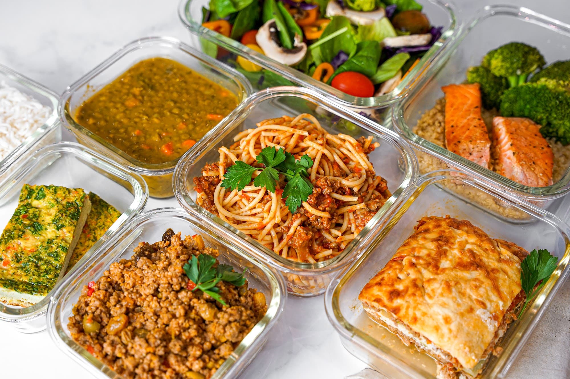 A Chefpost private chef plating a healthy family meal-prep dish in a Montclair kitchen