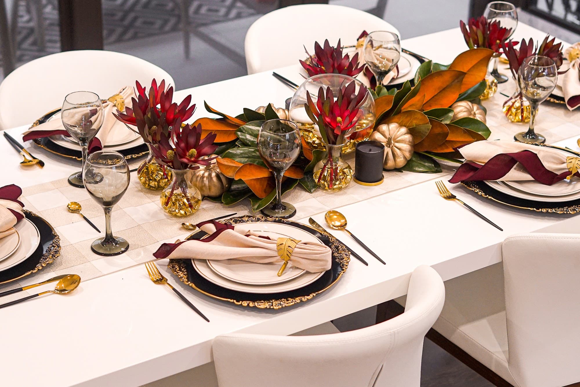 An elegant plated private chef dinner party set on a Long Island estate table