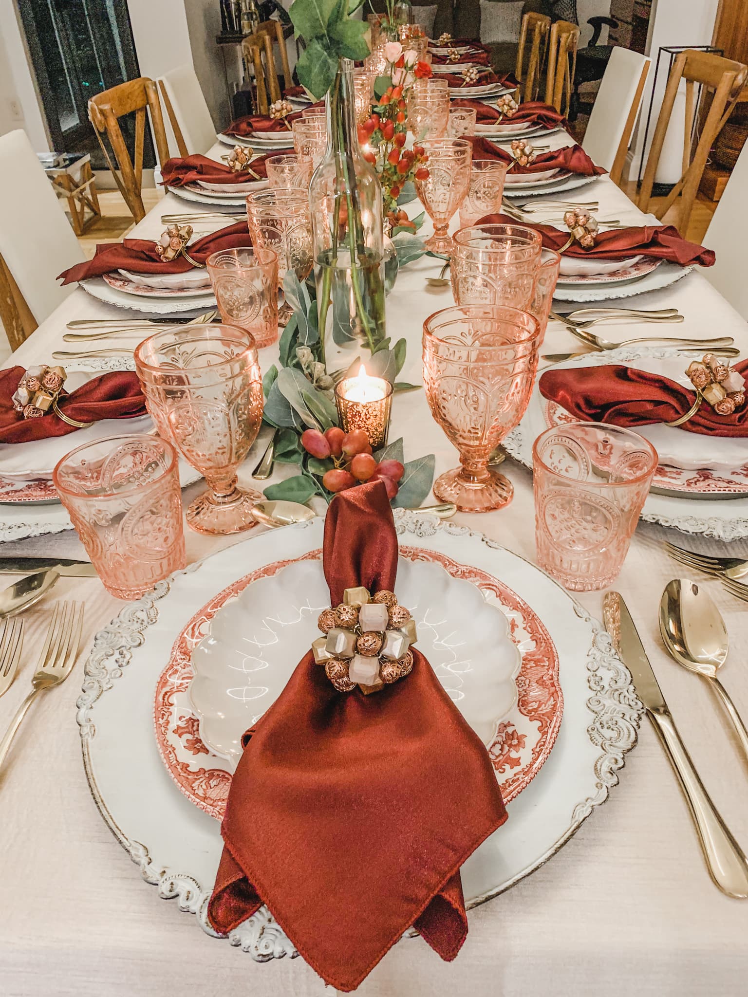 A formal autumn tablescape with terracotta napkins and gold flatware set by a private chef in Montclair